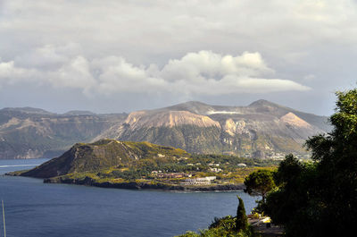 Scenic view of sea and mountains 