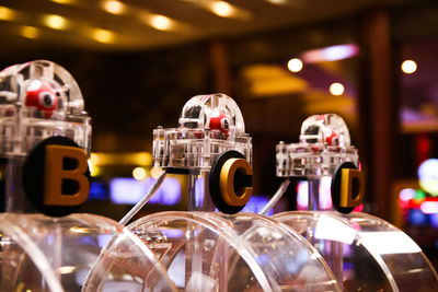 Close-up of wine glasses on table