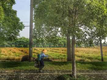 Boy standing in park