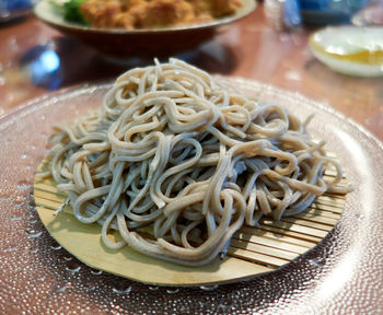 Close-up of noodles in bowl on table