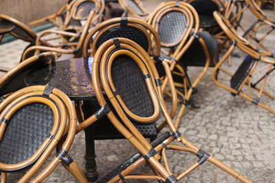 High angle view of chairs and tables at sidewalk cafe