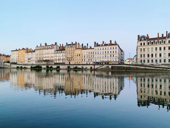 Reflection of buildings in lake