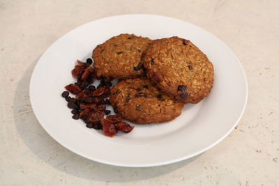 Close-up of cookies in plate on table