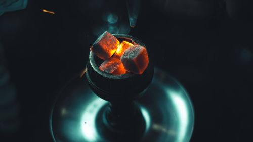 Close-up of illuminated candle