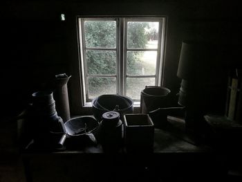 Electric lamp on table by window at home