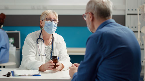 Female doctor working at clinic