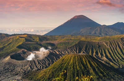 Scenic view of mountains against sky during sunset