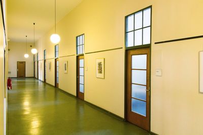 Illuminated corridor in office building