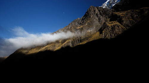 Low angle view of mountain against the sky