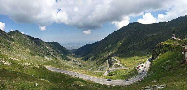 High angle view of road amidst mountains against sky