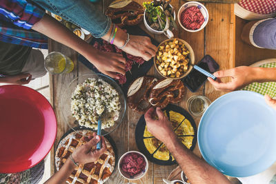 High angle view of people preparing food