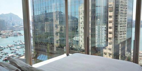 Modern buildings seen through glass window