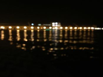 Defocused image of illuminated lights at night