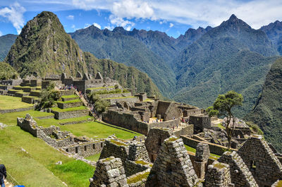 View of old ruins against cloudy sky