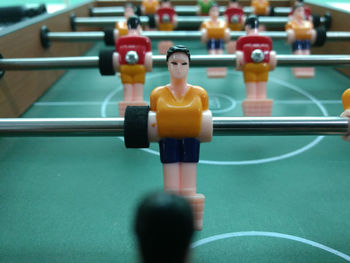 Close-up of foosball indoors