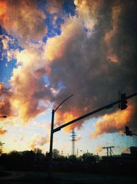 Low angle view of cloudy sky at sunset