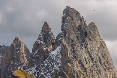 Seceda ridge in autumn with early snow in dolomites italy