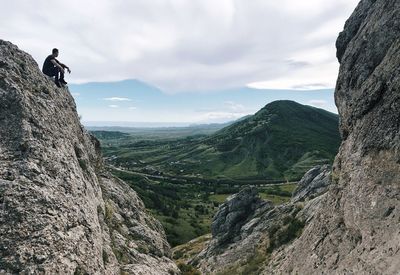 Panoramic view of rocks and mountains against sky