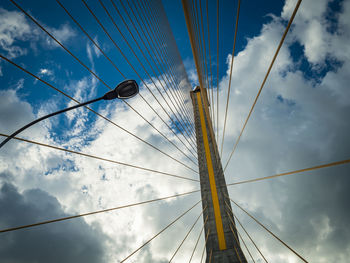 Low angle view of ferris wheel against sky