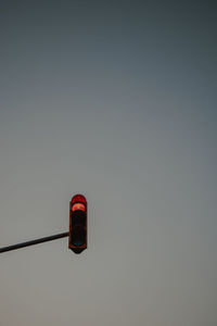 Low angle view of illuminated light against clear sky