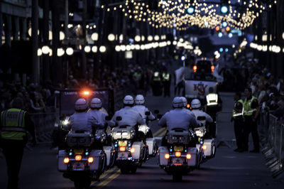 Vehicles on road at night police 