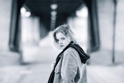 Portrait of woman standing in snow