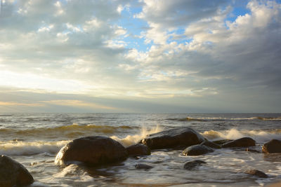 Scenic view of sea against sky during sunset