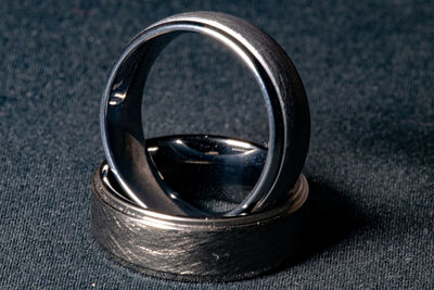 Close-up of rings on metal