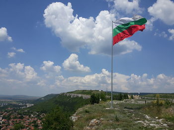 Low angle view of flag against sky