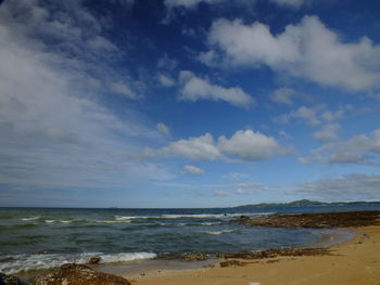 Scenic view of beach against sky