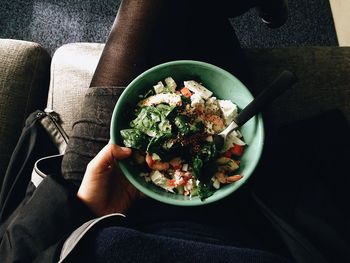 Close-up of woman holding food