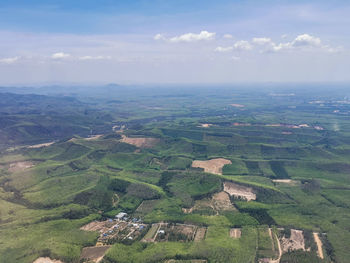 Aerial view of agricultural landscape against sky