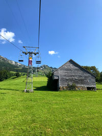 House on field against sky