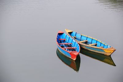 Two boats floating on water