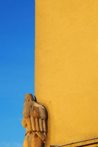 Low angle view of yellow building