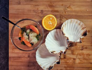 High angle view of fruits in plate on table
