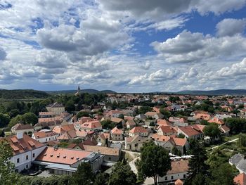 Aerial view of townscape against sky