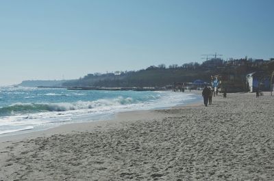 Scenic view of beach against clear sky