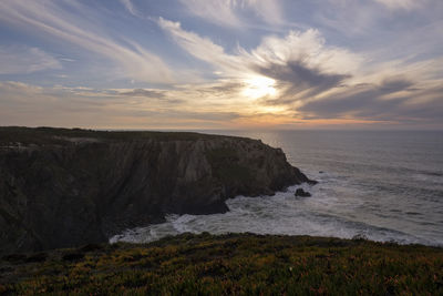 Scenic view of sea against sky during sunset