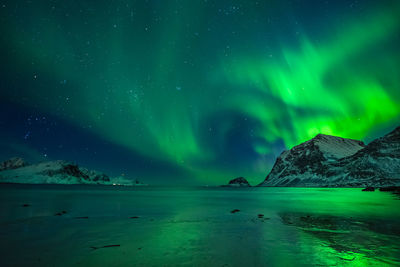 Scenic view of sea against sky at night