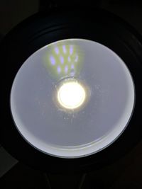 Low angle view of illuminated light bulb