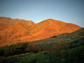 Scenic view of mountains against clear sky