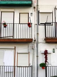 Low angle view of balconies on building