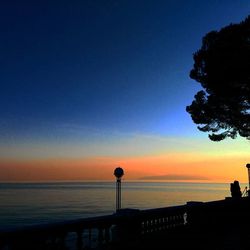 Scenic view of sea at sunset