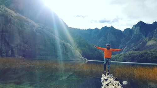 Man jumping on mountain