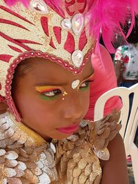 Close-up portrait of woman wearing mask