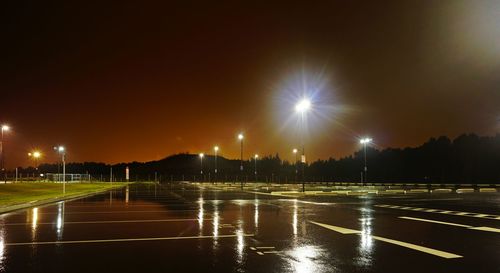 Illuminated street lights at night