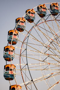 Closeup of multi-coloured giant wheel during dussehra mela in delhi, india. bottom view giant wheel