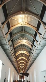 Low angle view of illuminated ceiling