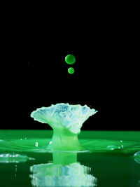 Close-up of water over black background